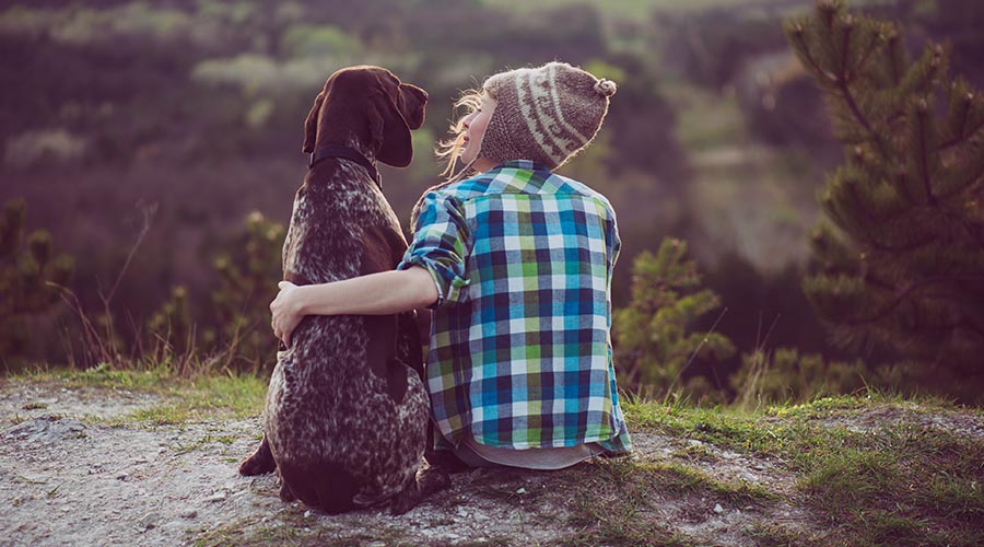 Woman And Her Dog Posing Outdoor.